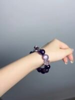 Hand Displaying Amethyst Mandala Bracelet (Lepidolite, Bolivian Amethyst), Water Energy Awakens Wisdom & Protection