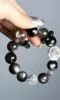 Multi-View of Layered Black Hole Bracelet, Water-Metal-Earth Energy Merges