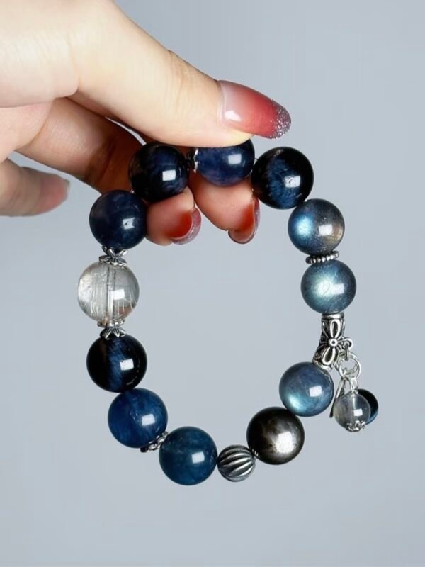 Close-Up of Silver Pendant, Metal Veins Carve Ocean Protection Spells