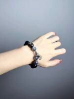 Hand Displaying Hell’s Eye Aquamarine Details, Water Veins Ignite Ocean Insight