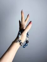 Hand Displaying Far Sea Starry Night Blue Crystal Bracelet (Aquamarine, Moonstone), Water-Metal-Earth Energy Awakens Ocean Spirit