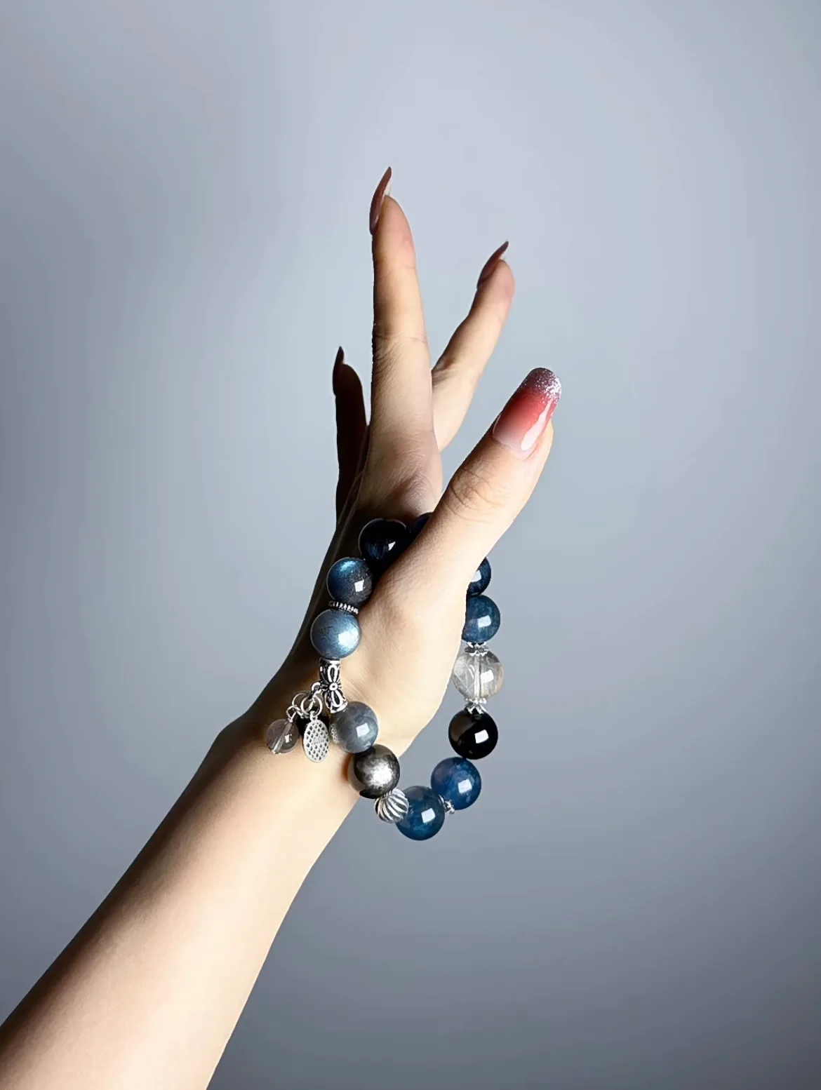 Hand Displaying Far Sea Starry Night Blue Crystal Bracelet (Aquamarine, Moonstone), Water-Metal-Earth Energy Awakens Ocean Spirit
