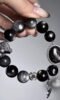 Layered Bracelet Close-Up, Metal-Earth-Water Sync Boosts Mental Toughness