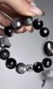 Layered Bracelet Close-Up, Metal-Earth-Water Sync Boosts Mental Toughness