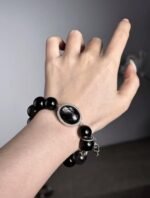 Hand Displaying Starshine Quartz Texture, Earth Veins Hold Stable Energy