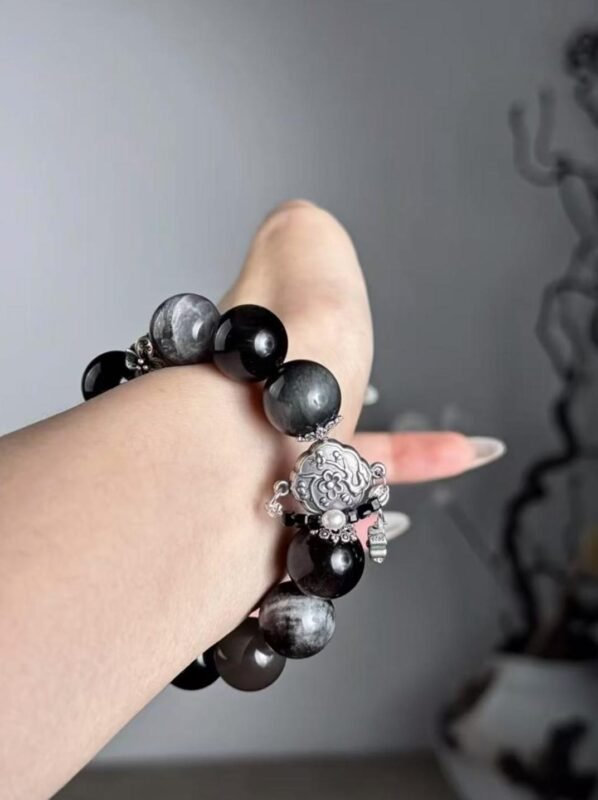 Hand Displaying Gold Rutilated Details, Metal Veins Ignite Courage