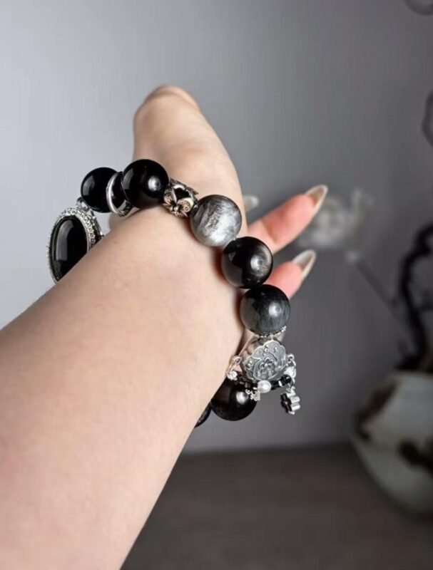 Hand Displaying Wushan Flower Gold Rutilated Bracelet (Hell’s Eye, Starshine Quartz), Metal-Earth-Water Energy Awakens Wushan Power