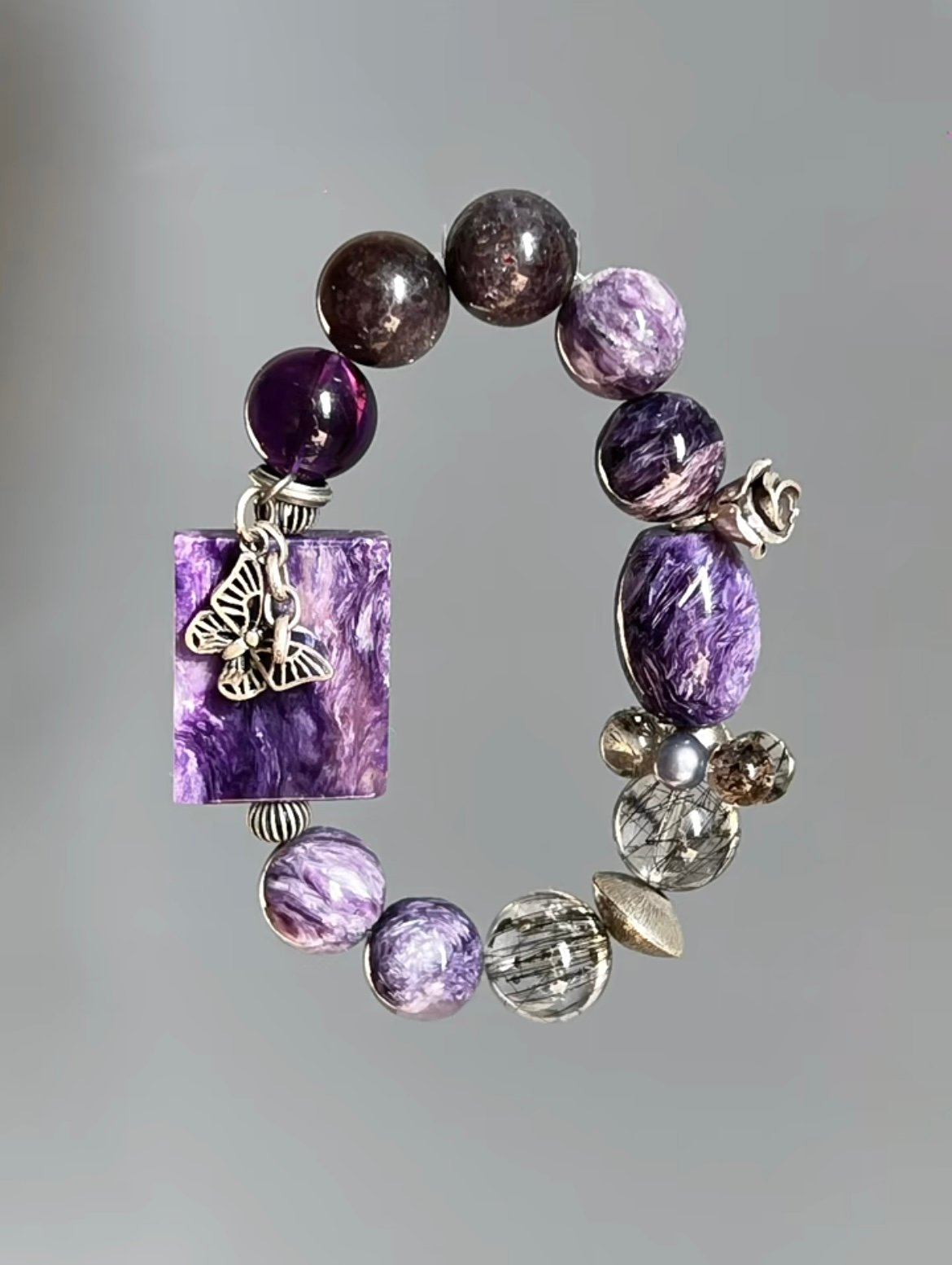 Charoite Multi-Gem Bracelet Display, Symbiosis Shows Spiritual Resilience