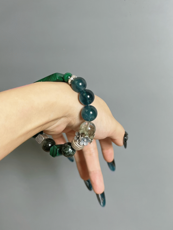 Hand Adjusting Malachite Bracelet, Wood-Water-Metal Energy Shows Nature Resilience