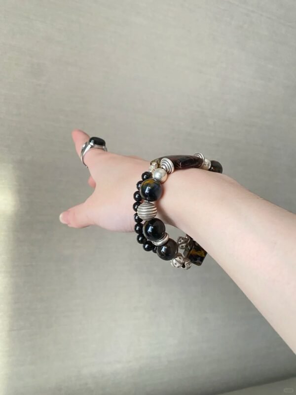 Hand Adjusting Pietersite Bracelet, Fire-Water-Metal Sync Boosts Breakthrough Awakening