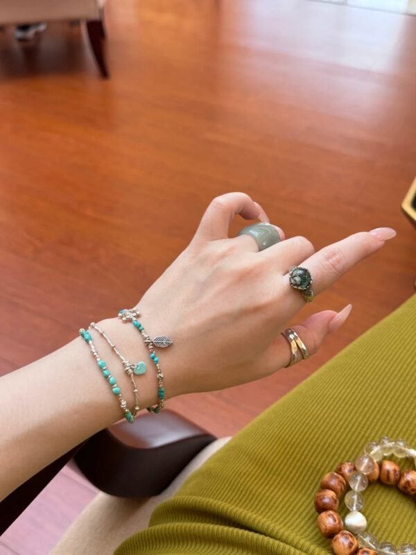 Close-Up of Turquoise Bracelet, Wood Veins Hold Healing Power