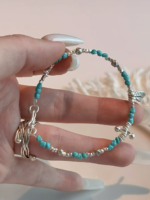 Hand Adjusting Turquoise Bracelet, Wood-Metal Rewrites Healing Path