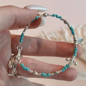 Hand Adjusting Turquoise Bracelet, Wood-Metal Rewrites Healing Path