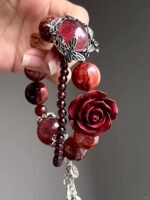 Close-Up of Cinnabar Rose Pendant, Desire Blade In Fire Veins