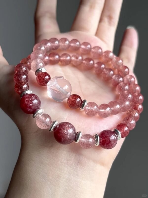 Hand-Showing Cherry Strawberry Quartz Main Bead, Courage Blade In Fire Veins