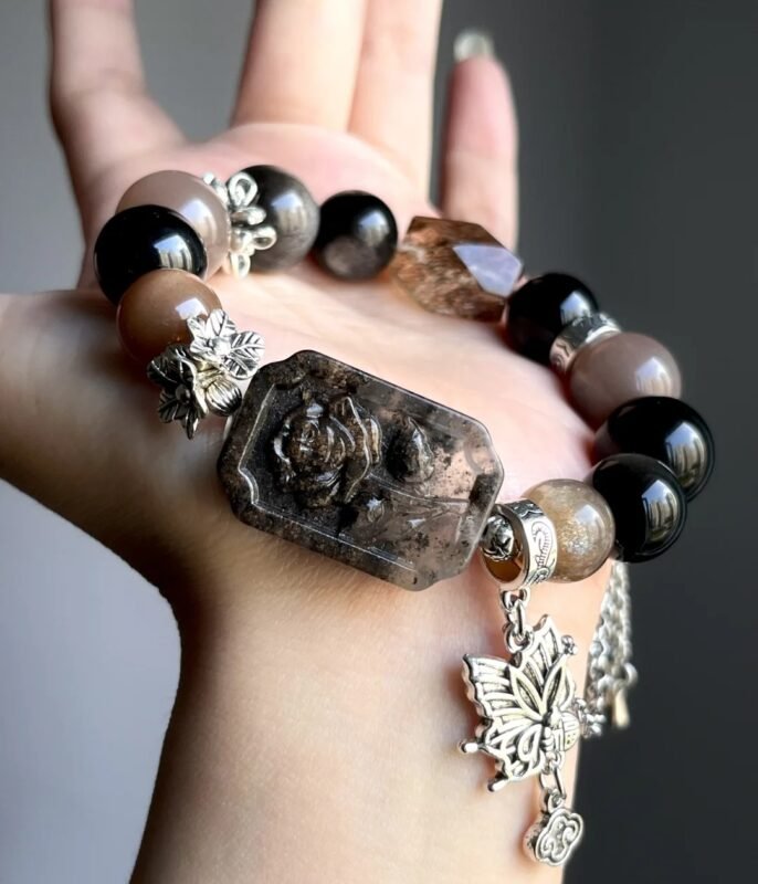 Hand-Showing Sunstone Main Bead, Passion Codes In Fire Veins