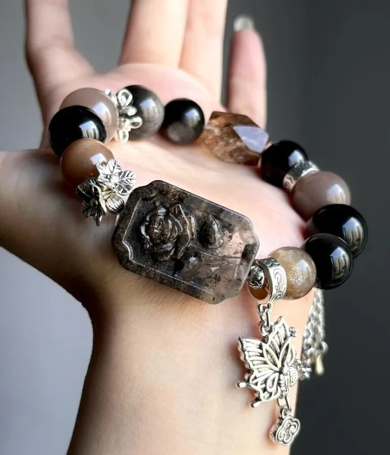 Hand-Showing Sunstone Main Bead, Passion Codes In Fire Veins