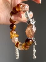 Hand-Showing Black Gold Super Seven Freeform, Passion Codes In Fire Veins