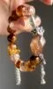 Hand-Showing Black Gold Super Seven Freeform, Passion Codes In Fire Veins