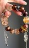 Close-Up of Multi-Gem Bracelet, Wealth Blade In Earth-Fire-Metal