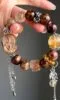 Close-Up of Multi-Gem Bracelet, Wealth Blade In Earth-Fire-Metal