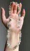 Hand-Showing Green Rutilated Accent Bead, Vitality Codes In Wood Veins