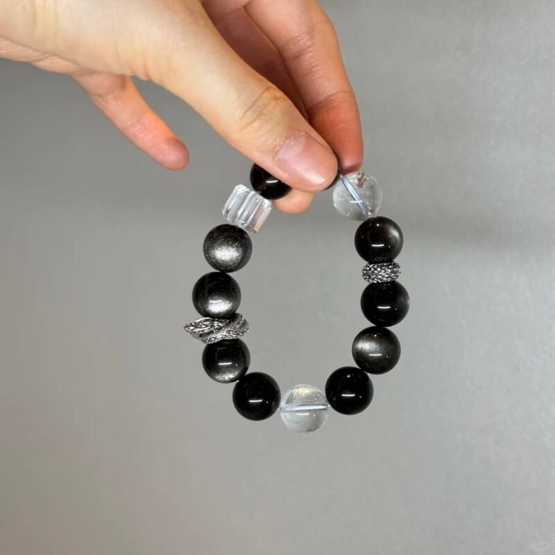 Holding Silver Obsidian Bracelet, Silver Dragon Ring’s Protective Energy Awakening