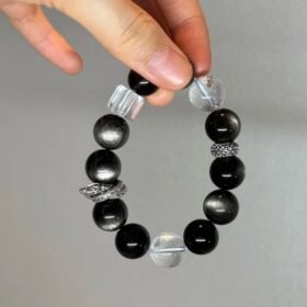 Holding Silver Obsidian Bracelet, Silver Dragon Ring’s Protective Energy Awakening