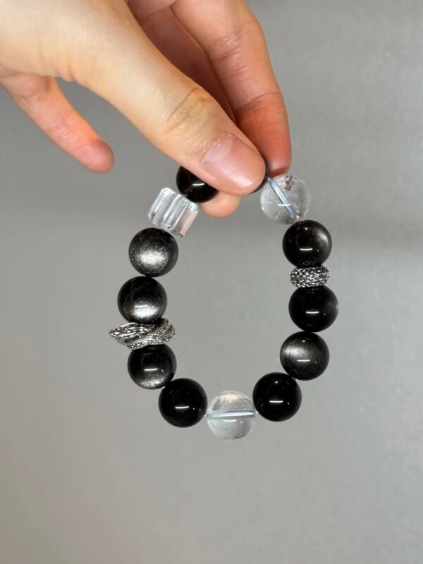 Holding Silver Obsidian Bracelet, Silver Dragon Ring’s Protective Energy Awakening