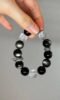Holding Silver Obsidian Bracelet, Silver Dragon Ring’s Protective Energy Awakening