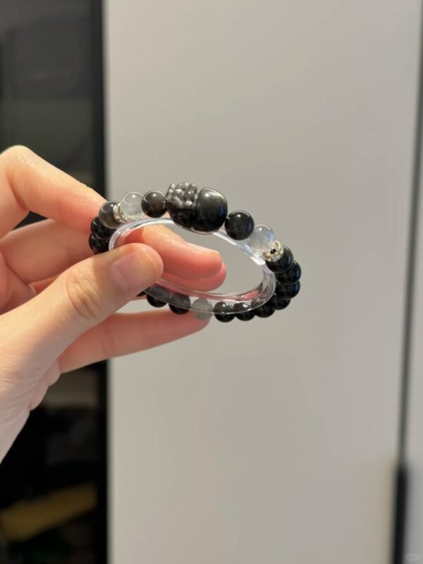 Holding Obsidian Bracelet, Multi-Bead Details & Energy Loop