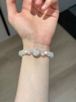 Displaying Blue Moonstone Bracelet Details On Wrist, Snow Phantom Quartz Energy Texture