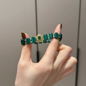 Holding Malachite Bracelet With Silver-Gold Accents, Earth-Metal Energy Weaves Wealth Field