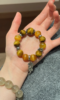 Holding Bracelet With 13mm Golden Tiger’s Eye, 13mm Yellow Tiger’s Eye, 16mm Yellow Tiger’s Eye & Silver Accent, Metal-Fire Energies Intertwine