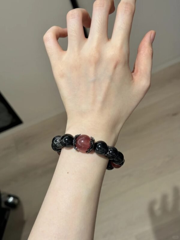 Displaying Obsidian Bracelet Details On Hand, Strawberry Quartz & Zircon + 925 Silver Black Gold Plating's Wood Energy Awakening