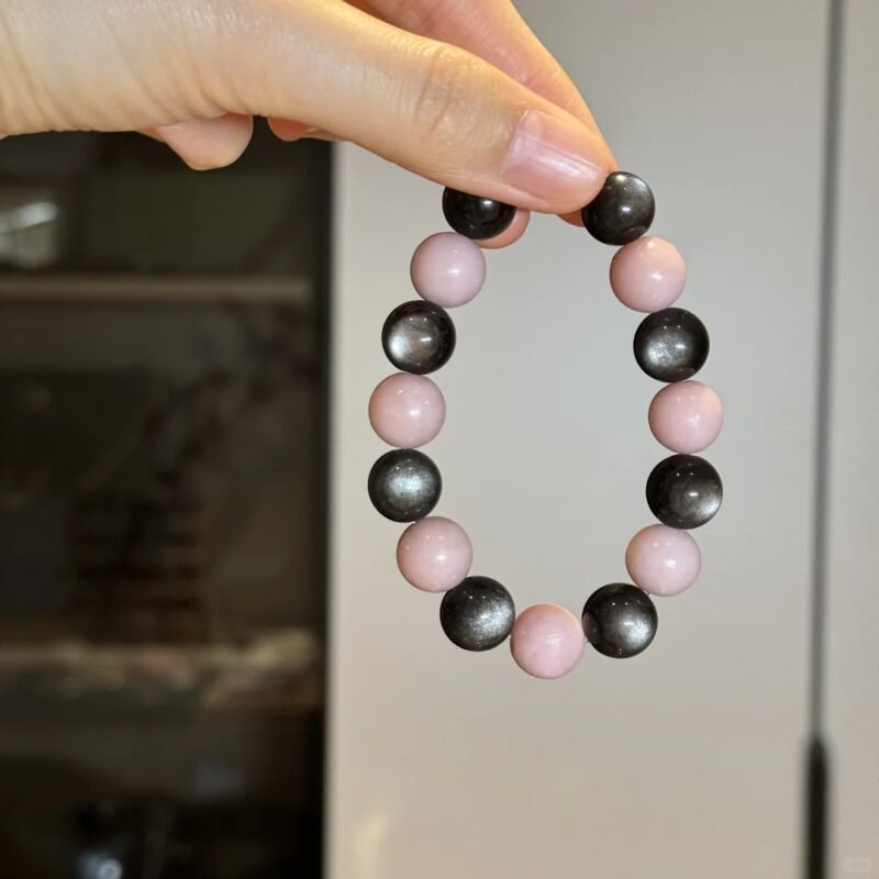 Holding Silver Obsidian & Pink Opal Bracelet, Water-Metal Ultimate Protection Sync