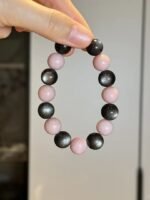 Holding Silver Obsidian & Pink Opal Bracelet, Water-Metal Ultimate Protection Sync