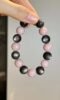 Holding Silver Obsidian & Pink Opal Bracelet, Water-Metal Ultimate Protection Sync