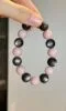 Holding Silver Obsidian & Pink Opal Bracelet, Water-Metal Ultimate Protection Sync