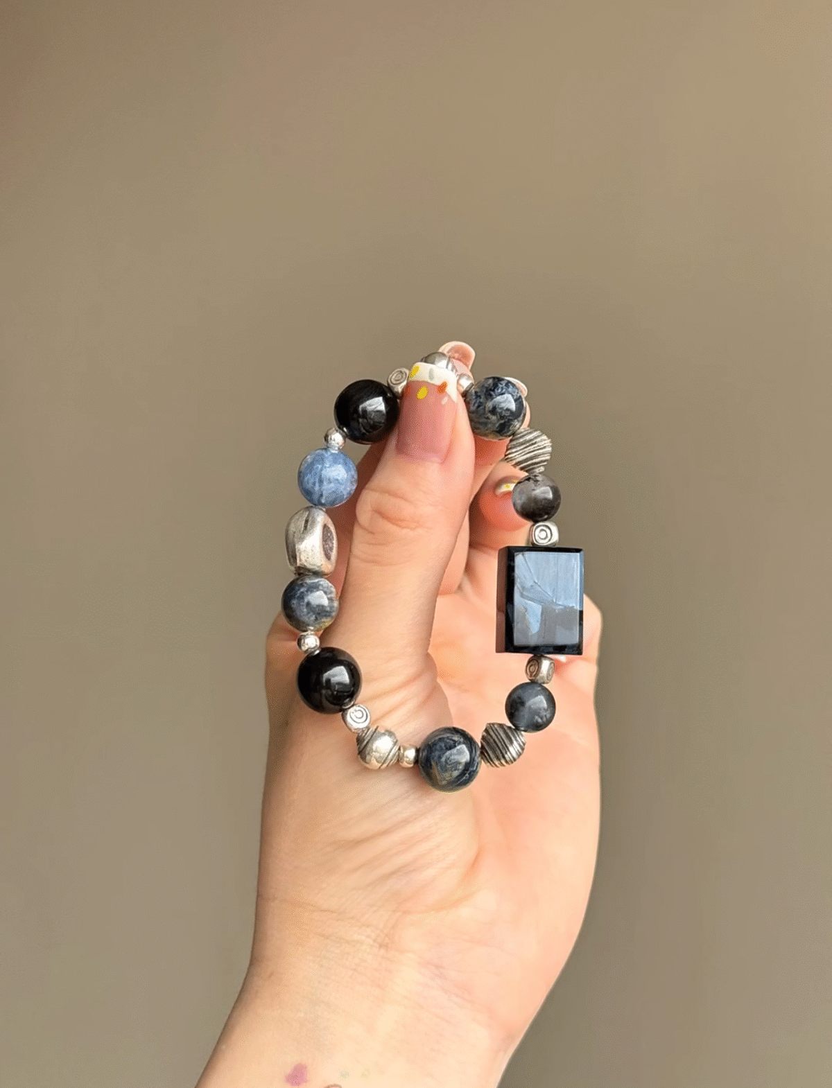 Holding Pietersite Bracelet, Ultimate Courage & Fate Transformation