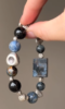 Holding Pietersite Bracelet, Multi-Crystal Details & Energy Loop