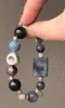 Holding Pietersite Bracelet, Multi-Crystal Details & Energy Loop