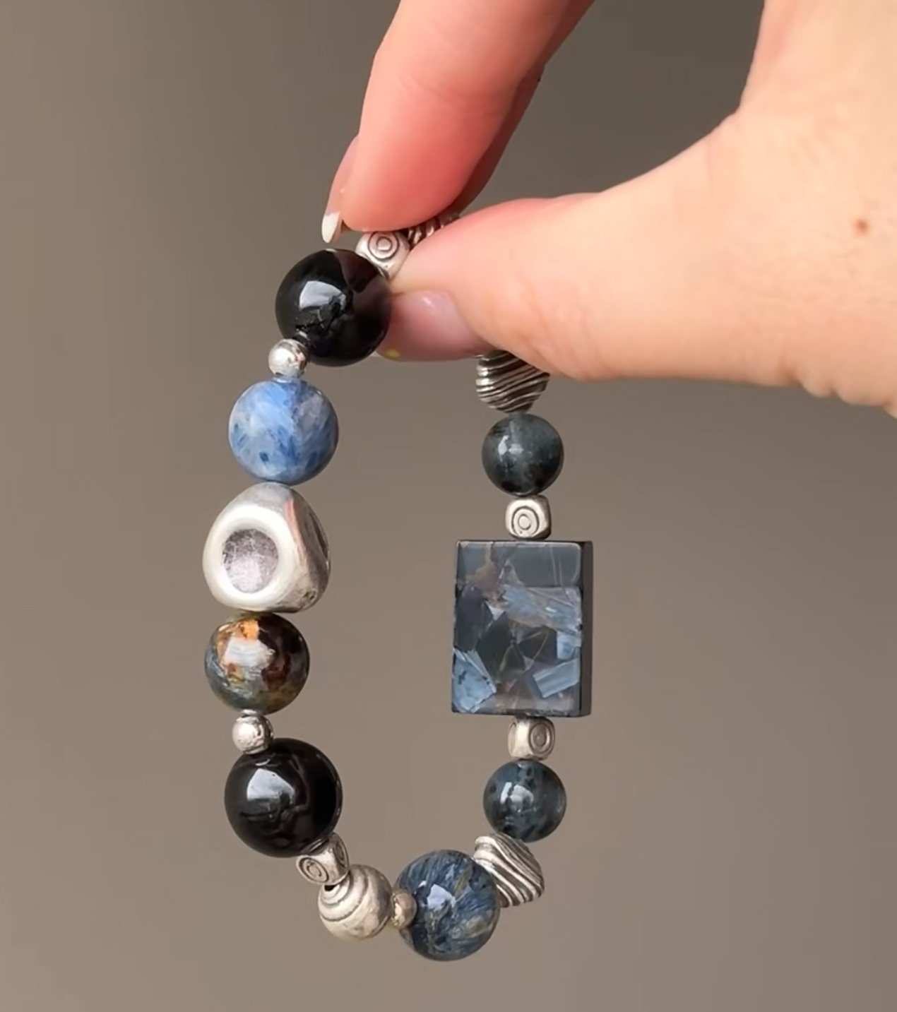 Holding Pietersite Bracelet, Multi-Crystal Details & Energy Loop