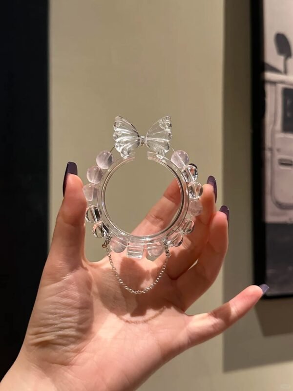 Holding Clear Quartz Butterfly Bracelet, Rose Quartz Love Energy Resonance