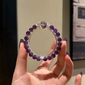 Holding Uruguay Amethyst + Purple Tower Quartz Bracelet, Top-Bead Spiritual Focus