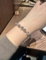 Wearing Blue Flash Moonstone Bracelet, Silver-Accented Spiritual Glow