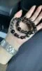 Holding Silver Obsidian Bracelet, Metal-Wood Energy Explosion