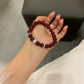 Holding Garnet Bracelet, Fire Energy Focus In Round Beads