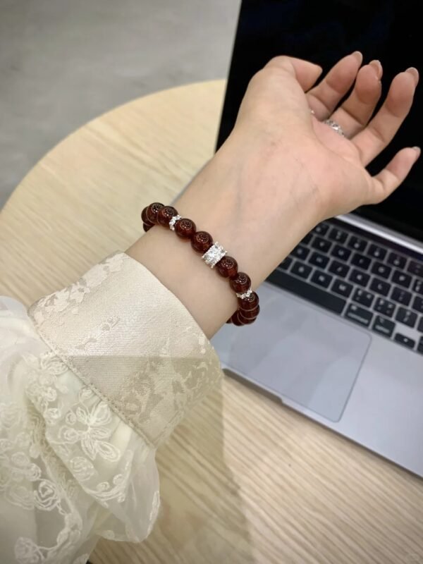 Wearing Garnet Bracelet On Wrist, Fire Energy Boost At Work