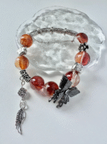 Red Fire Quartz Bracelet Resting, Tassel’s Energy Extension